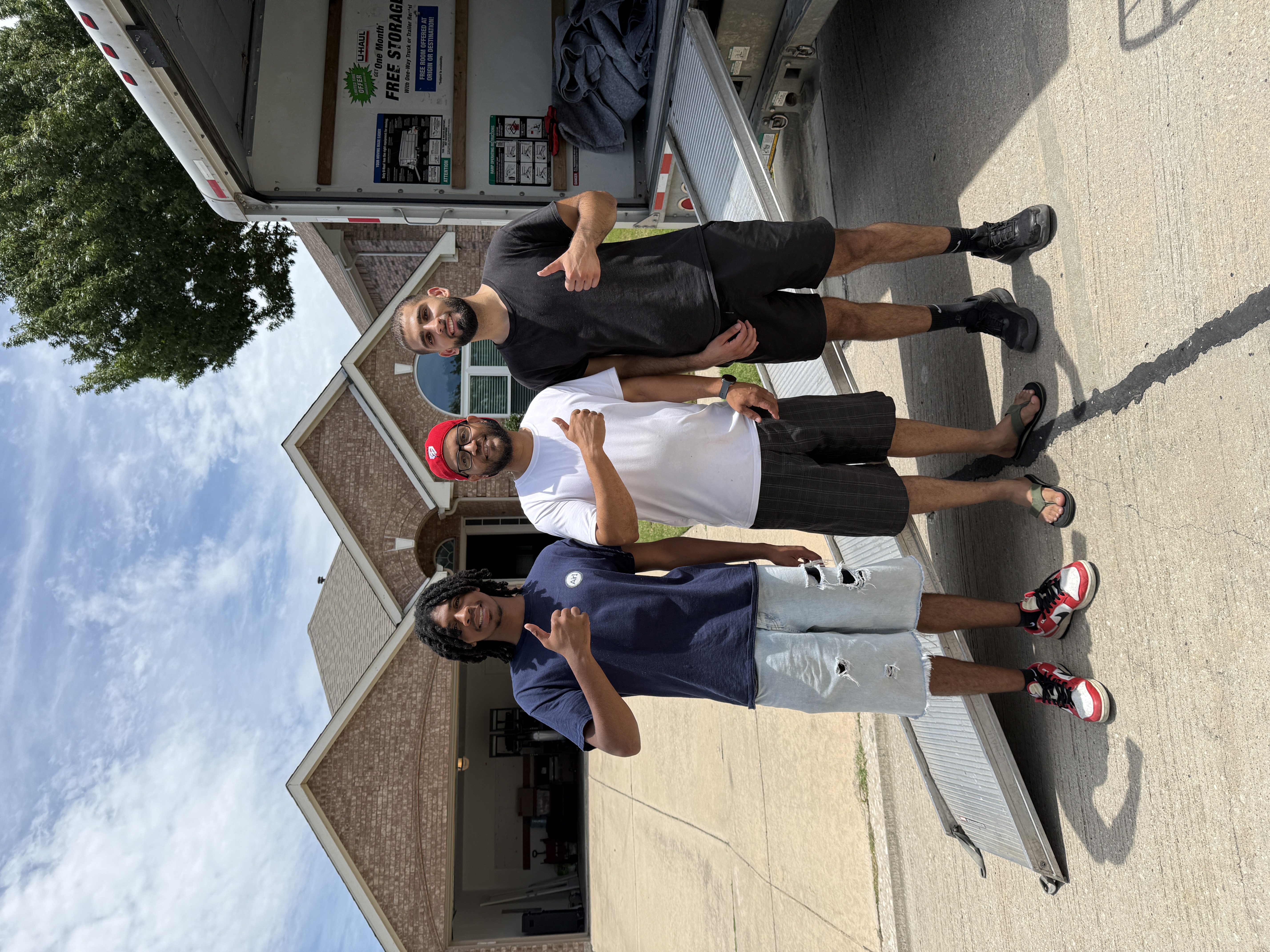 Nahas Moving crew with happy customer after house move in North Texas